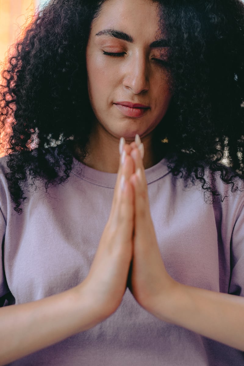 A Woman Praying Intently 